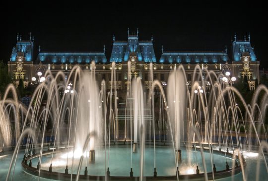The famous Palace of Culture in Iasi, Romania with fountains in front of it